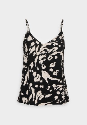 Camisole sans manches à motif abstrait en noir et blanc avec fines bretelles et un décolleté en V sur un fond uni.
