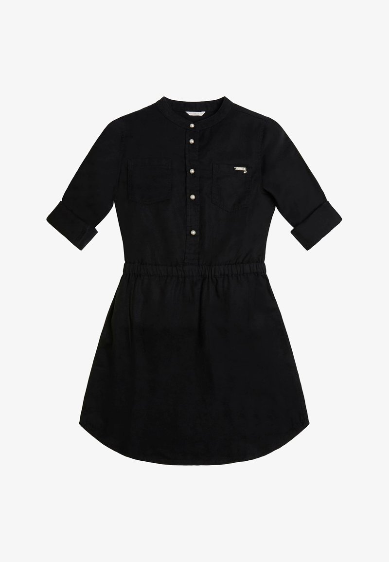 Robe noire en tissu doux, avec un devant à boutons, un col, deux poches poitrine et une taille élastique avec une jupe évasée.