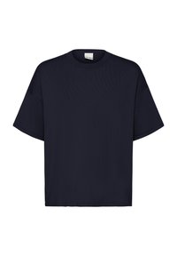 T-shirt oversize bleu marine en tissu doux, avec un col rond et des manches courtes à coupe ample. Design minimaliste, sans motifs.