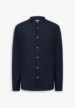 Dunkelblaue Langarmbluse mit Stehkragen und durchgehender Knopfleiste mit beigen Knöpfen.