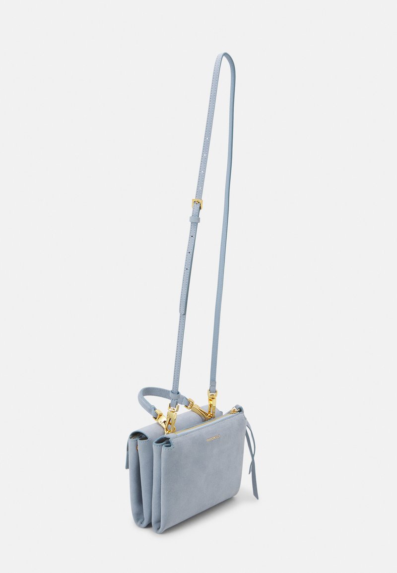 Bolso De Mano Coccinelle Blue Soft - Cuero De Vaca, Correa Ajustable, Diseño Elegante (color Café)