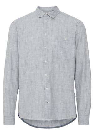 Gara piedurkne krekls gaiszi zilas un baltas vertikālas svītras, kokvilnas audums, pogājama priekšpuse, viena krūšu kabata, izliekta apakšmala, pogājamas aproces.