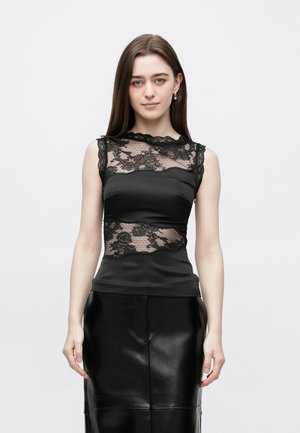 Malina DESIRE TRIMMED CUT OUT - Blus - black