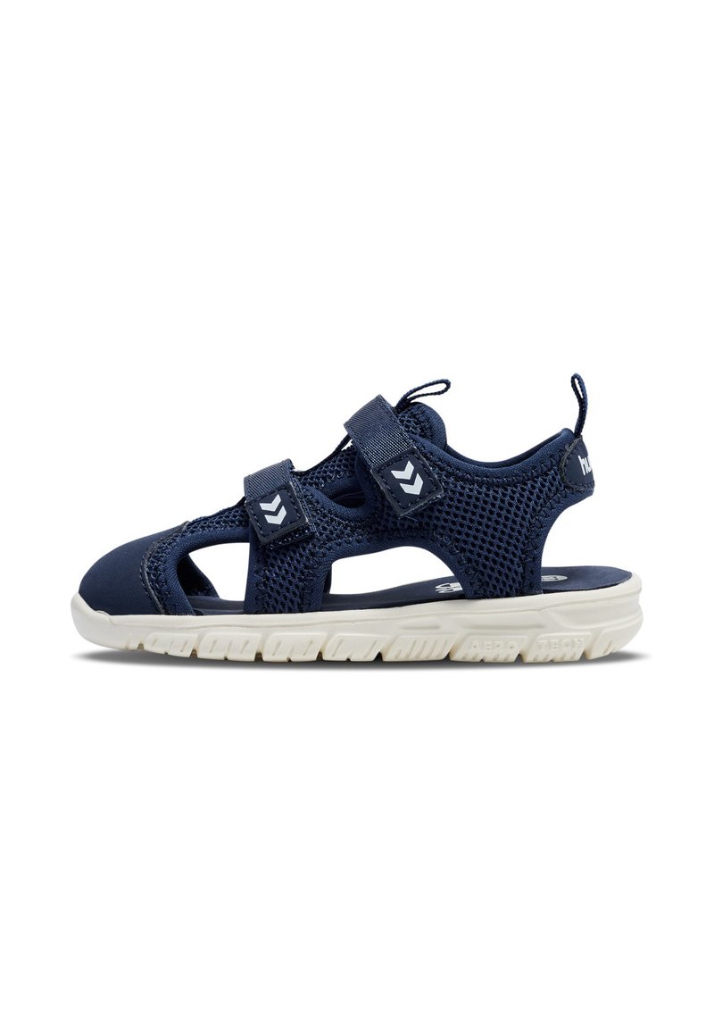 Navy blue mesh sandal with white accents, featuring two adjustable straps, a textured rubber sole, and cut-out design for breathability.