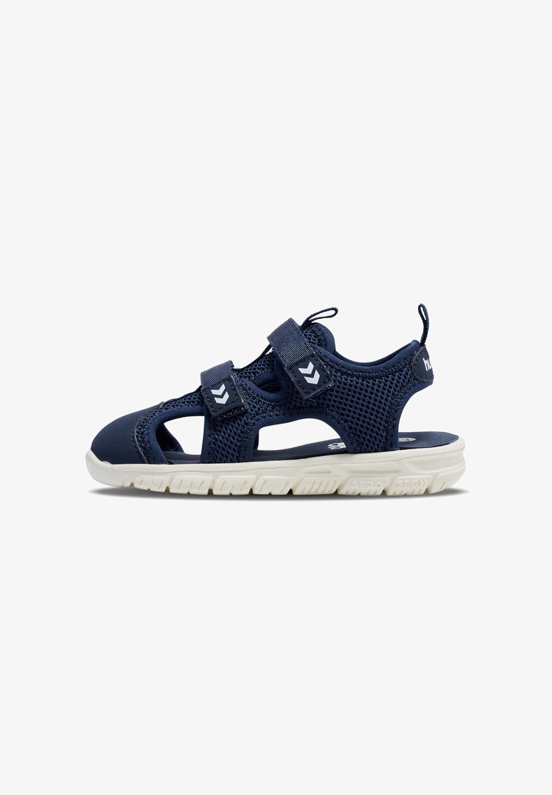 Navy blue mesh sandal with white accents, featuring two adjustable straps, a textured rubber sole, and cut-out design for breathability.