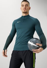 Under Armour CHALLENGER PRO - Donji dijelovi trenirke - black/ high-visibility yellow
