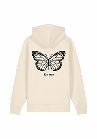 Kremeni dukserica s grafikom crne leptirice i tekstom "Fly Away" ispod. Mekana tkanina, dugi rukavi i kapuljača s vezicom.