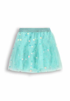 Jasnoniebieska spódnica z tiulu z błyszczącym pasem i wielokolorowymi kropkami. Projekt jest warstwowy, co nadaje pełniejszy kształt.