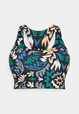 Sujetador deportivo impreso con fondo negro adornado con patrones coloridos de hojas y flores en verde, azul, beige y rosa.