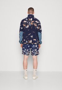 KAVU TEANNAWAY - Felpa in pile - blue/multi colour