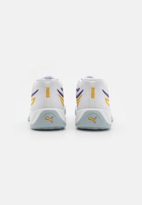 Puma COURT PRO  - Zapatillas de baloncesto - yellow sizzle/team violet
