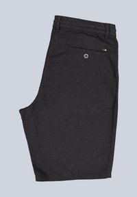 Black cotton shorts with a textured finish, elastic waistband, single back pocket, and a button closure. Side angled view.