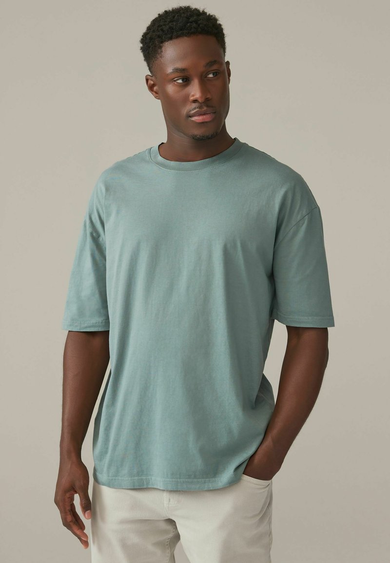 Next RELAXED FIT zielony