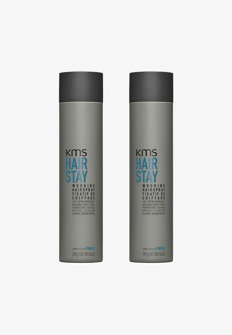 Two grey aerosol cans labeled "KMS HAIR STAY" featuring blue text. Each contains 239 g of working hairspray with clear, modern design.