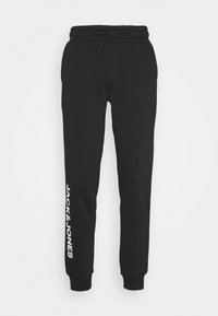 Jack & Jones Performance - JJIGORDON SIDE PANTS - Treniņtērpa apakšdaļas - black Miniatūras attēls 1