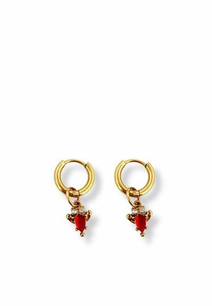 Gold hoop earrings with red teardrop-shaped gems and small clear crystals hanging as charms.