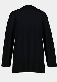 Zwarte lange mouwen cardigan, gemaakt van lichte stof. Heeft een geribbelde zoom en manchetten, met een open voorkant en zonder sluitingen.