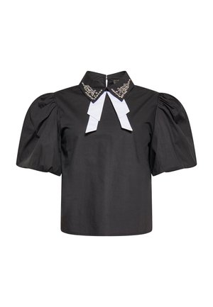 Mustade pallidega puuvillane topp, millel on kõrge krae, valgete paeltega kaunistused ja selge kividega kaunistatud krae.