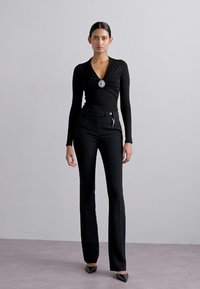 Roberto Cavalli PANTS - Pantalon classique - nero