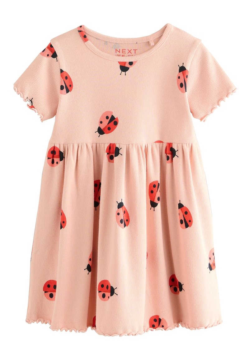 Robe rose à manches courtes pour tout-petit avec imprimé coccinelle rouge et noire et bords festonnés aux manches et à l'ourlet.