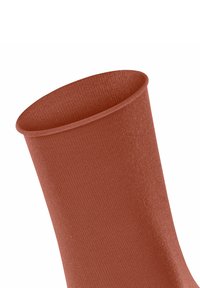 Roestkleurige textielbuis met een gladde, ribbelige textuur en een brede, open bovenkant. Het materiaal lijkt rekbaar en aansluitend.
