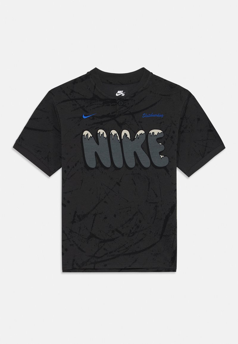 Black cotton t-shirt featuring a prominent gray "NIKE" graphic with white drips, blue "Skateboarding" text, and a textured design.