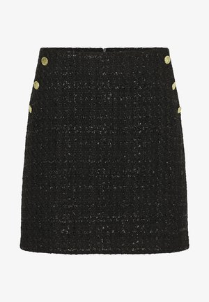 Sort tweednederdel med en struktureret form, subtil tekstur og guldbelagte knapdetaljer på siden.