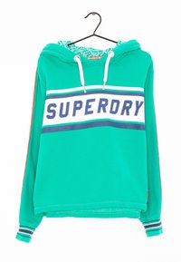 Sudadera turquesa con detalles en blanco, que presenta "SUPERDRY" en letras azules en negrita, un forro de capucha con un patrón colorido y puños de mangas a rayas.