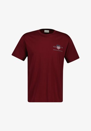 Bordowa bawełniana koszulka z krótkim rękawem z logo z przodu z napisem "GANT" i "AMERICAN SPORTSWEAR". Klasyczny krój z okrągłym dekoltem.