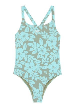 Eendelig badpak met een turkoois bloemenpatroon op een lichtgroene achtergrond en gekruiste schouderbandjes.