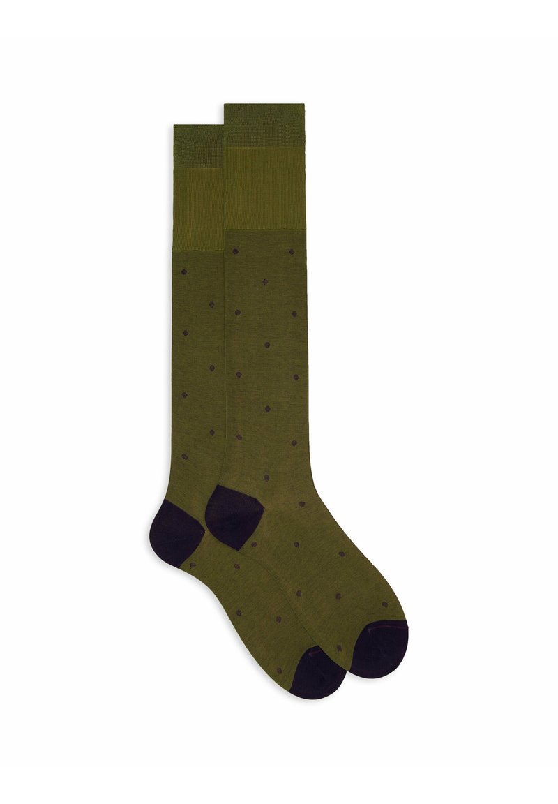 Calze lunghe verde oliva, con una texture a coste caratterizzata da pois navy e dettagli navy sul tallone e sulla punta.