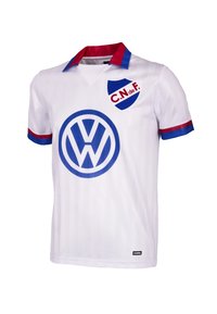 Witte voetbalshirt met rode en blauwe accenten. Bevat een blauw Volkswagen-logo en het 'C.N. de F.' schild. Gemaakt van gladde stof.