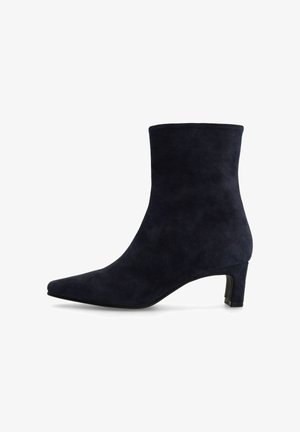 Suede ankle boot in navy with a pointed toe and a small, block heel. Smooth texture with no visible embellishments or patterns.