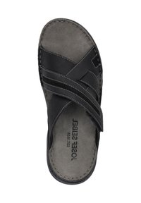 Sandale en cuir noir avec des brides croisées, une semelle intérieure grise rembourrée et des détails de couture visibles. La semelle est plate et de design simple.