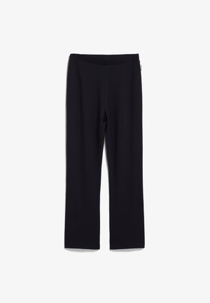 Schwarze, dehnbare Hosen mit einer taillierten Passform, ausgestattet mit einem elastischen Bund. Glatte Textur und gerader Schnitt ohne sichtbare Nähte.