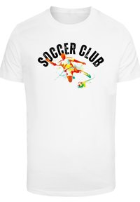 White cotton t-shirt featuring colorful graphic of a soccer player with "SOCCER CLUB" text in bold black above. Short sleeves and crew neck.