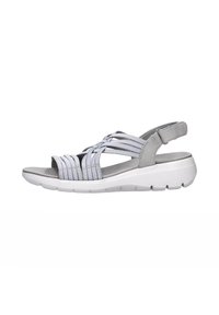 Sandalo grigio con cinturini intrecciati in tessuto elastico, suola ammortizzata e cinturino alla caviglia regolabile, progettato per comfort e supporto.