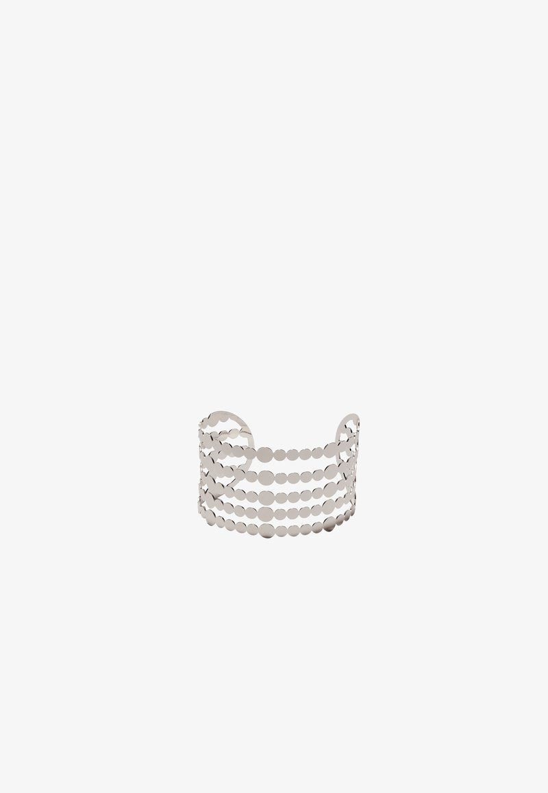 Bracelet manchette en argent avec cinq rangées horizontales de disques ronds reliés, créant un design ouvert et aéré.