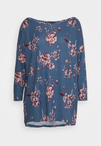 Blå långärmad tunika med rosa och vinröda blommönster, rund halsringning och lös passform.