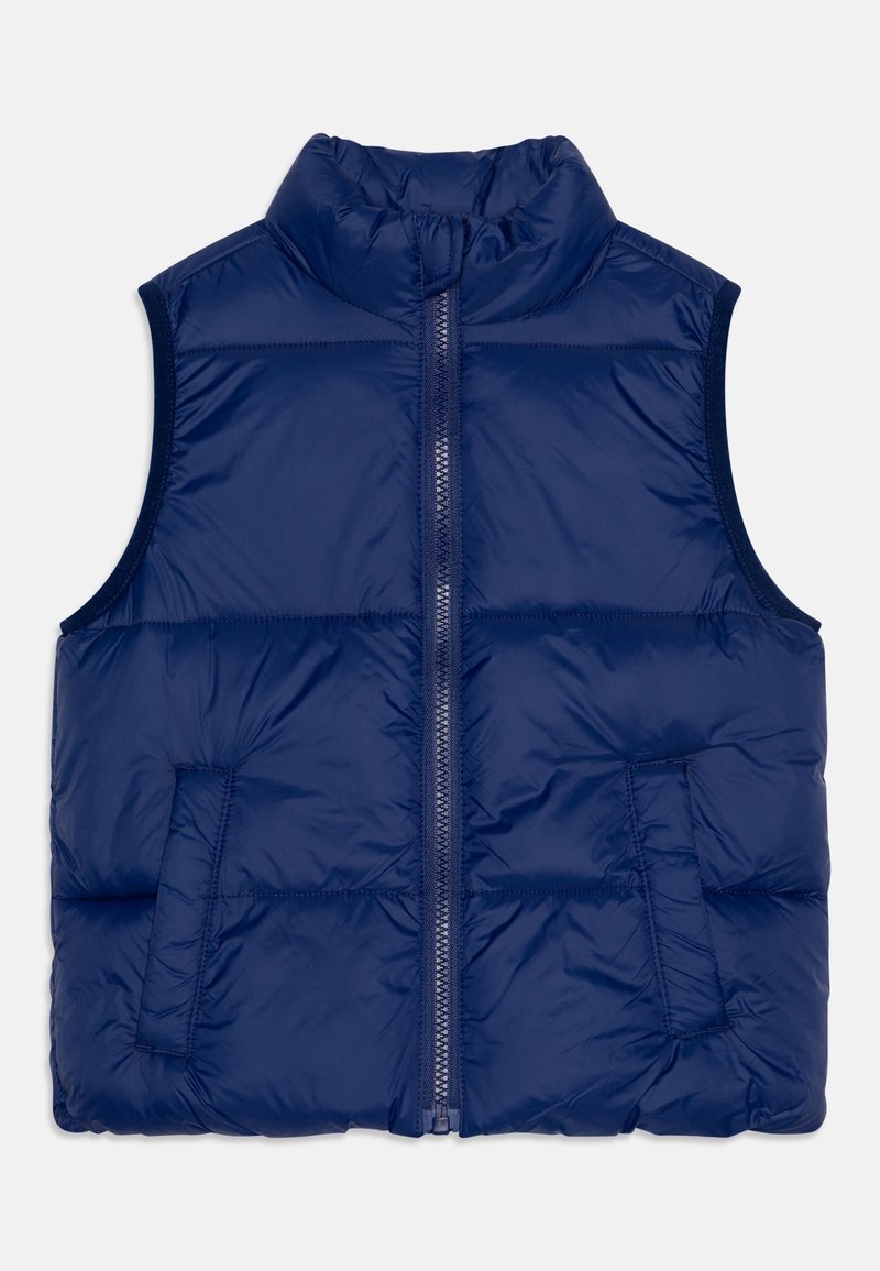 Veste sans manches matelassée bleu marine avec fermeture éclair avant et deux poches latérales, conçue pour la chaleur et un port décontracté.