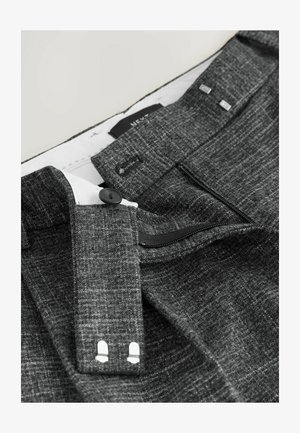 Gray textured trousers featuring a button closure, zip fly, and additional hooks, with silver accents on the waistband and inside lining.