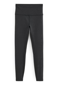 Zwarte sportleggings gemaakt van rekbaar materiaal, met een hoge tailleband, platte naden en een aansluitende pasvorm.