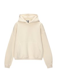 Krémová mikina s kapucí vyrobená z měkké látky, s přední klokaní kapsou a žebrovanými manžetami. Volný střih s minimalistickým designem.