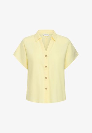 Chemise à manches courtes jaune clair avec col et quatre boutons sur le devant, présentée sur un fond blanc.