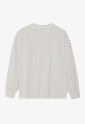 Lichtgrijze langarm t-shirt van zacht katoen. Heeft een losse pasvorm, ronde halslijn en zachtGathered manchetten. Geen patronen of graphics.