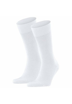 Paar schlichter weißer Kniestrümpfe mit Rippbündchen, aufrecht auf weißem Hintergrund dargestellt.