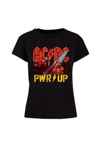 Black cotton t-shirt featuring a graphic print with "AC/DC" in red and "PWR UP" in yellow, alongside images of band members and instruments.