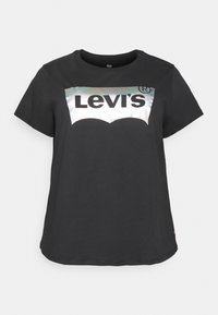 Czarna koszulka z krótkim rękawem z odblaskowym, srebrnym logo Levi's na piersi oraz okrągłym dekoltem.