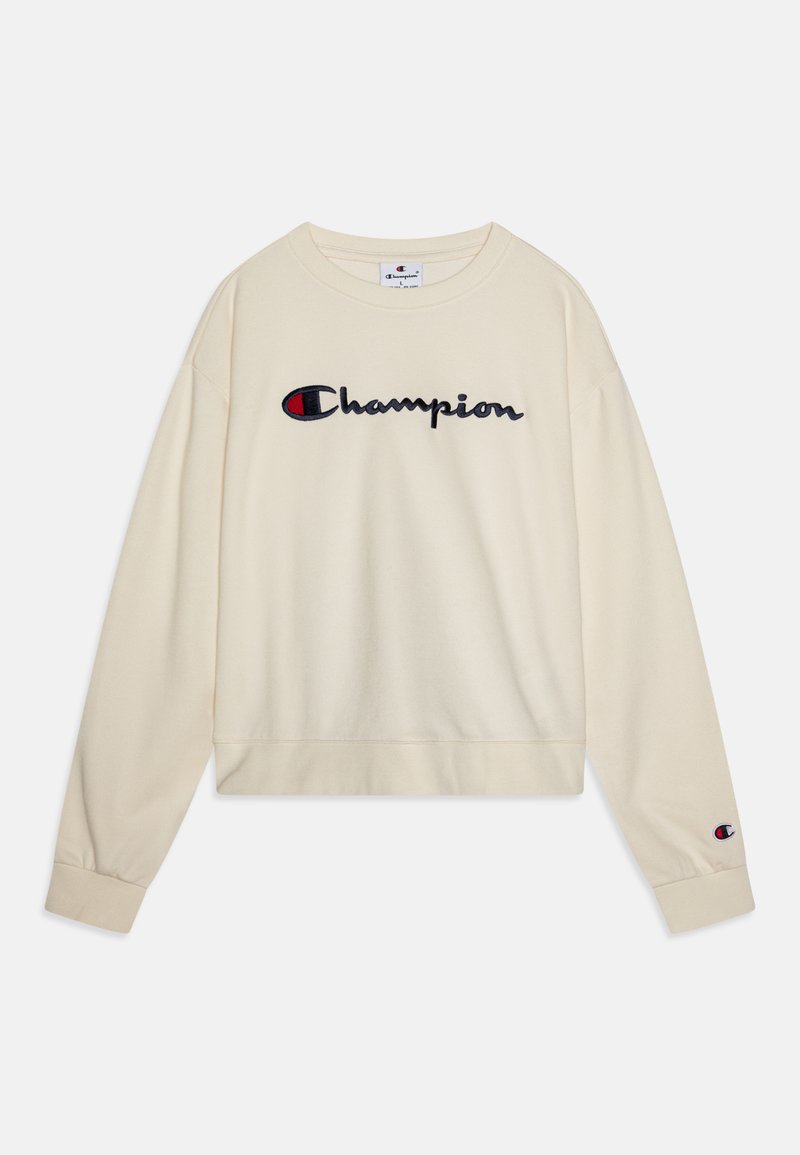 Kremowy sweter z okrągłym dekoltem, z żebrowanym wykończeniem, haftowanym logo "Champion" w odcieniach granatu i czerwieni oraz elastycznymi mankietami.