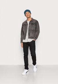 Levi's® TRUCKER JACKET - Casaco de ganga - round midnight trucker
